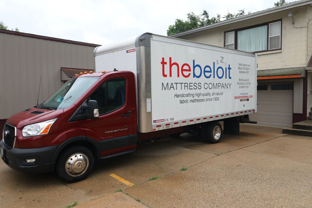 The Beloit Mattress Company delivery truck at the factory
