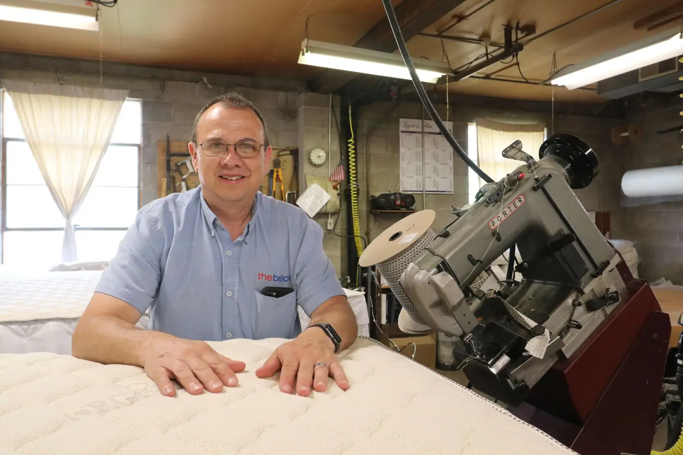 A Beloit bedmaker at the workbench building a mattress in the Beloit, Wisconsin factory